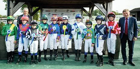 John Inverdale and Brough Scott with the 2022 Shetland pony jockeys